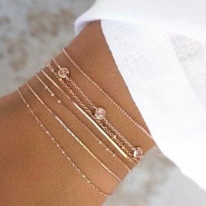 3/$33 7 Piece Gold Bracelet Set